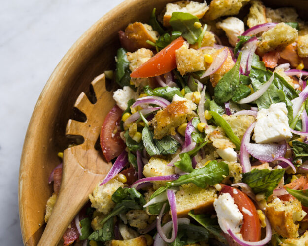 Marinated tomatoes and crisp corn bring punchy summer  flavors to bread salad
